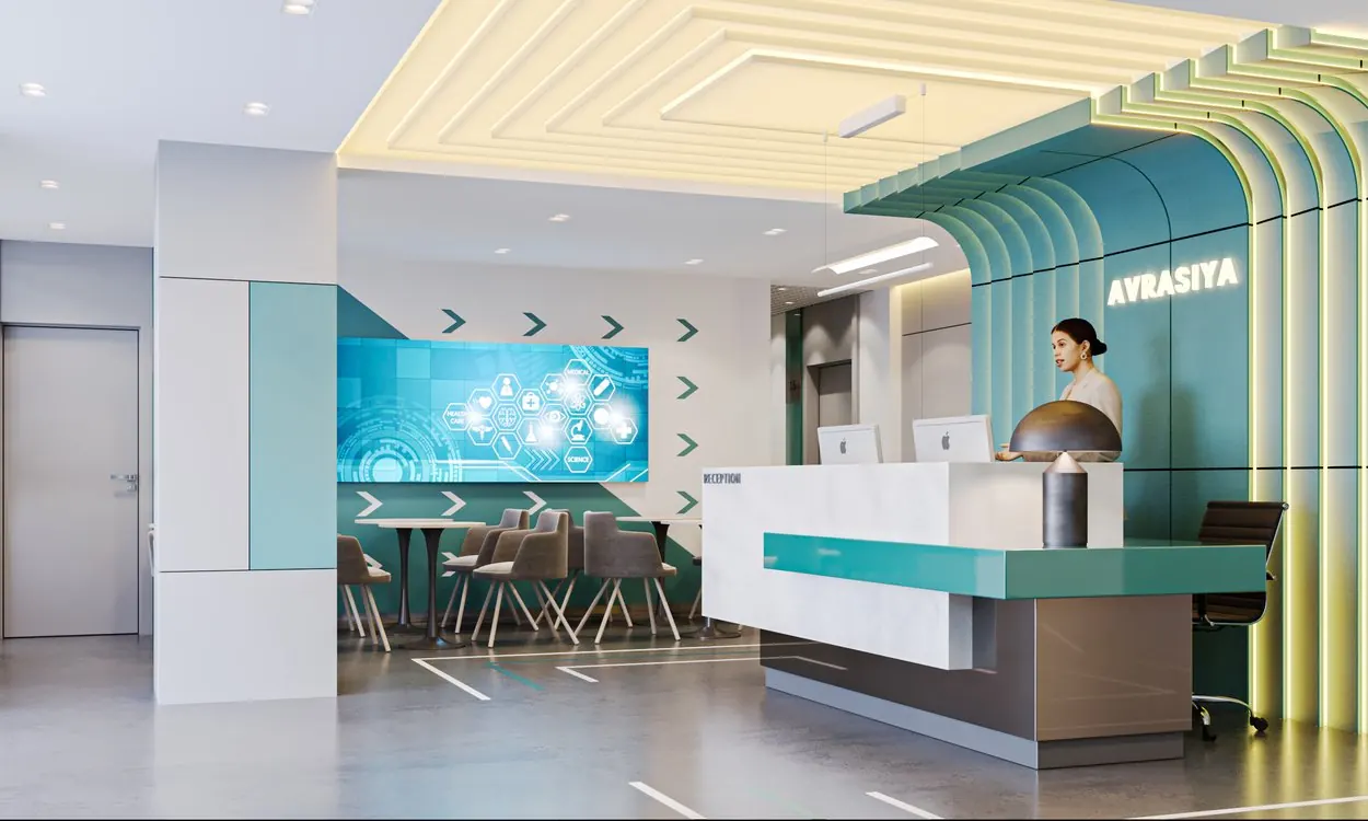 Eurasia Clinique — Main reception counter and waiting zone with natural stone surfaces and integrated digital directories